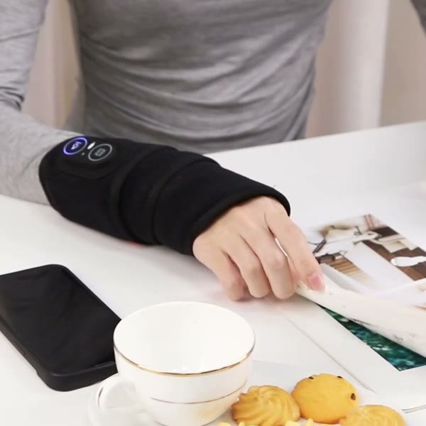 Wearing the wrap at a table with a cup of tea and a magazine